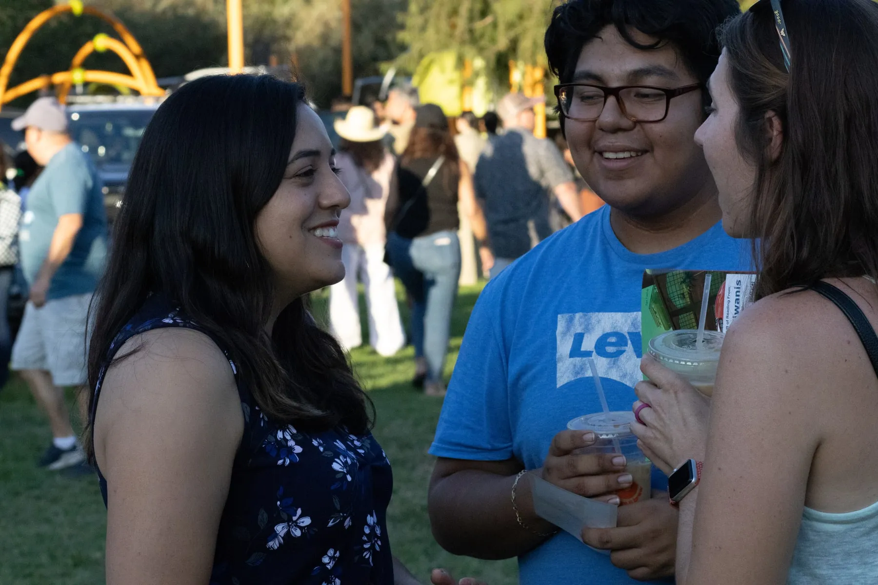 Nikki Perez sharing a laugh with neighbors at a Burbank community event.